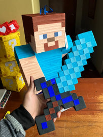 Celebrate with a Minecraft Steve piñata perfect for fun and pixel-style parties